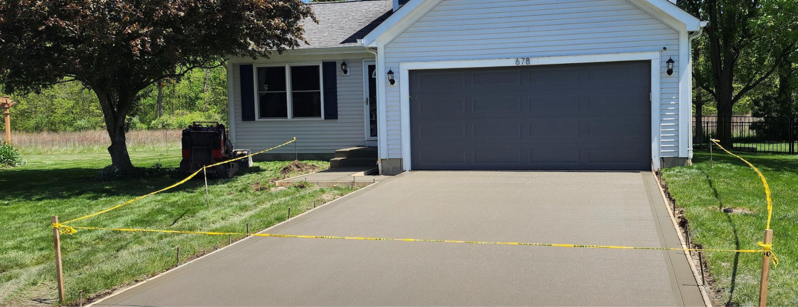 New smooth concrete driveway